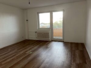 Wohnzimmer mit Balkon